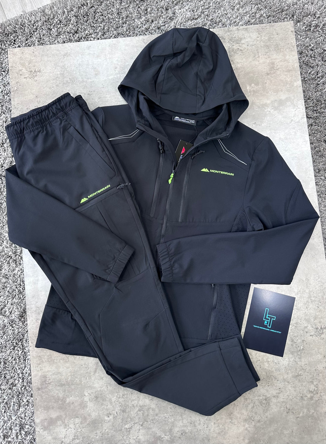 MONTERRAIN WOVEN TRACKSUIT - BLACK/VOLT