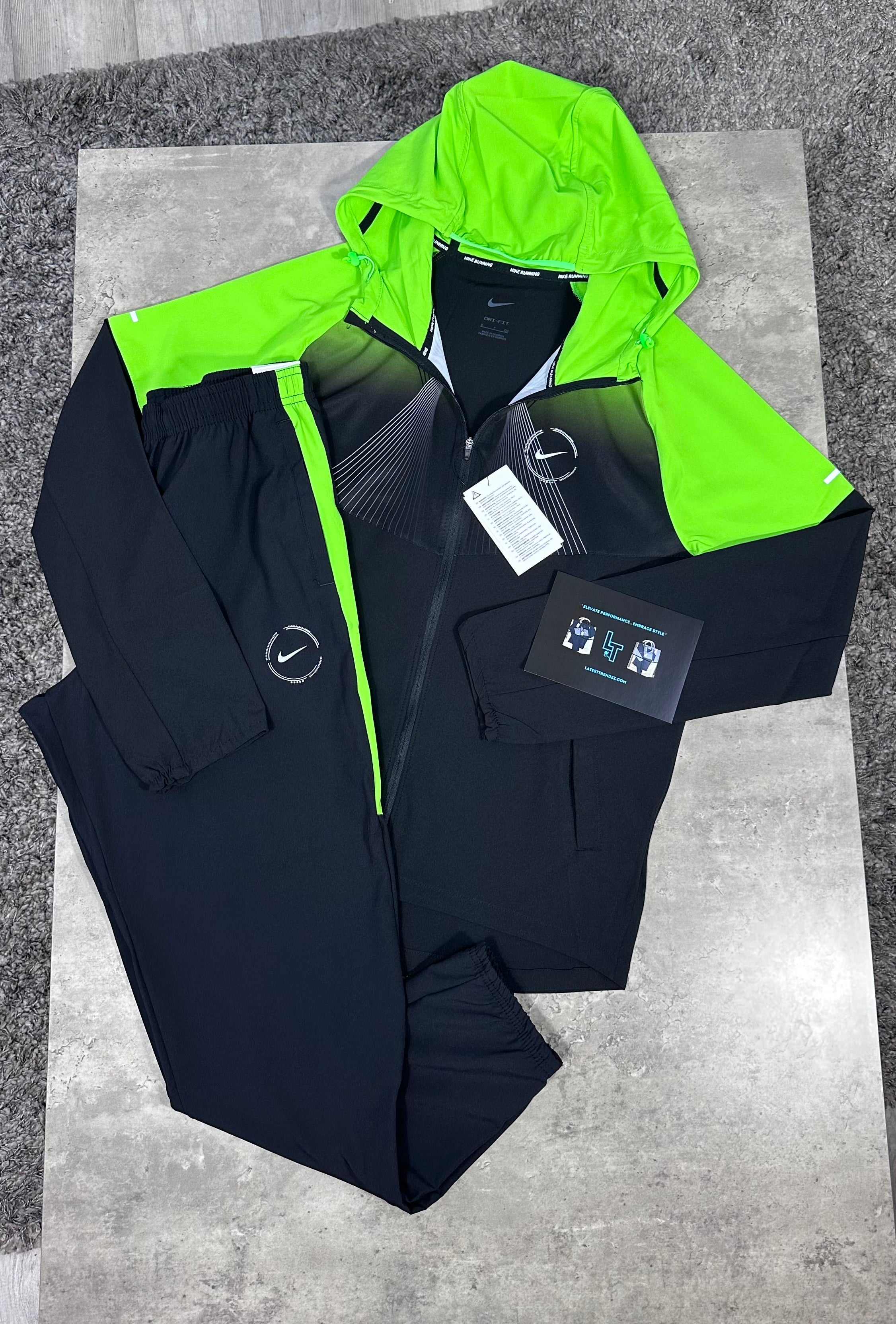 black and green nike tracksuit